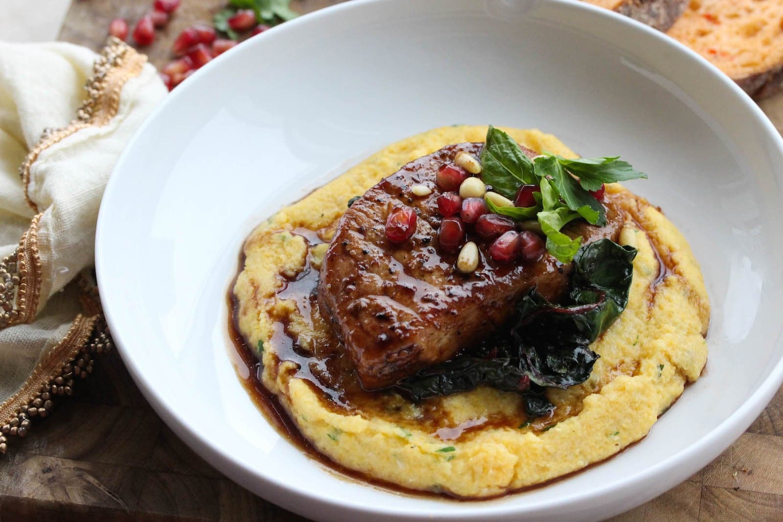 Balsamic Glazed Pork with Roasted Garlic Herb Polenta and Greens