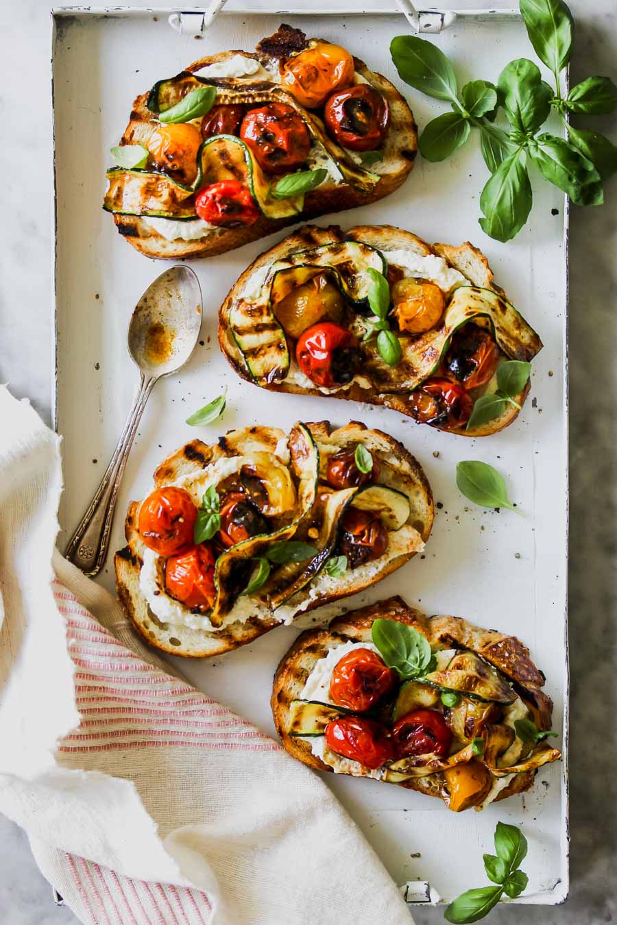 Blistered Tomato and Zucchini Tartines with Whipped Feta