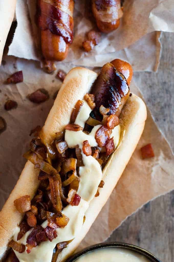 Bacon Wrapped Hot Dogs with Cheese Sauce